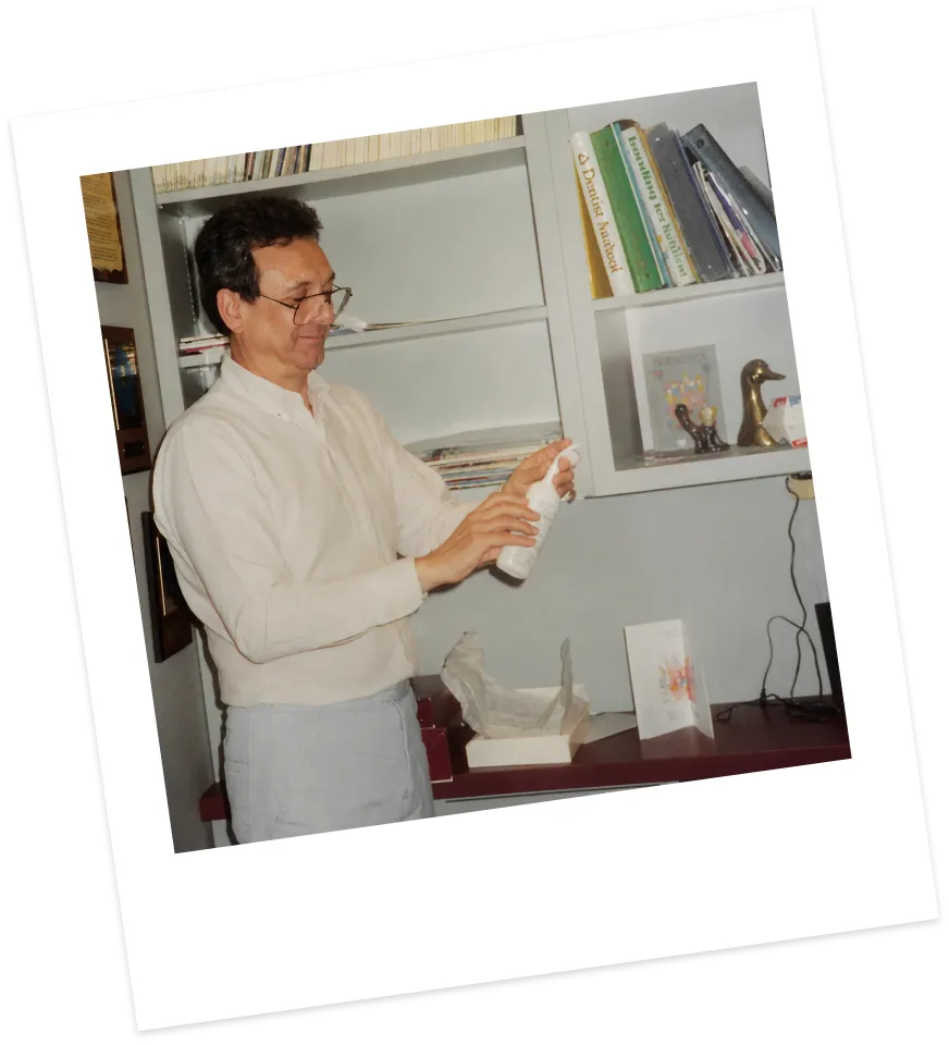 Dr. Marvin Cohen holding an early SmartMouth bottle