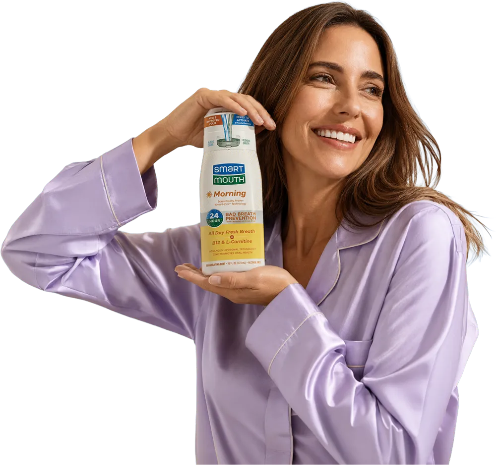 Woman holding SmartMouth Morning mouthwash
